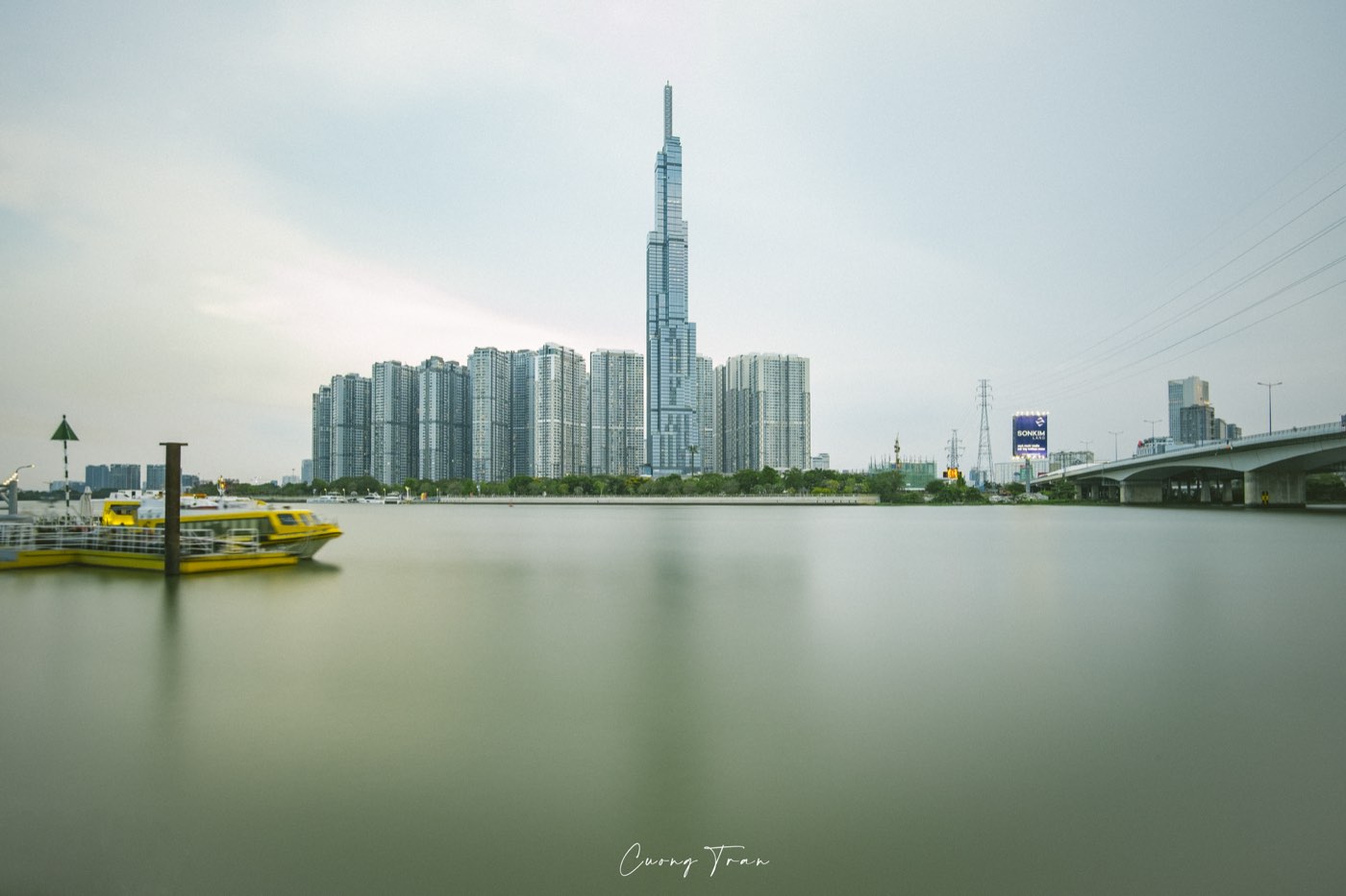 Landmark 81 and the Vinhomes towers on one bank, Thảo Điền's expat riverside on the other.